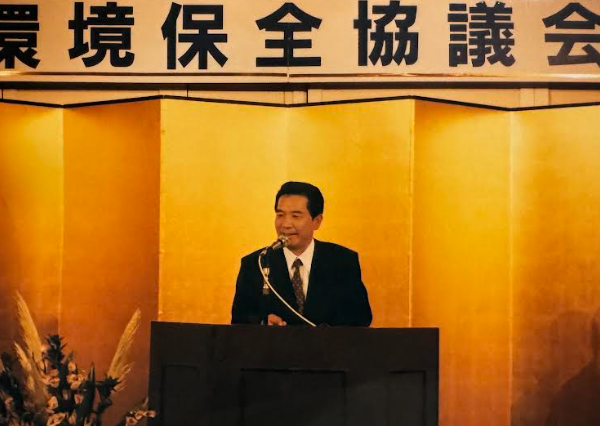 熊本県環境保全協議会の研修会で挨拶する宮﨑社長