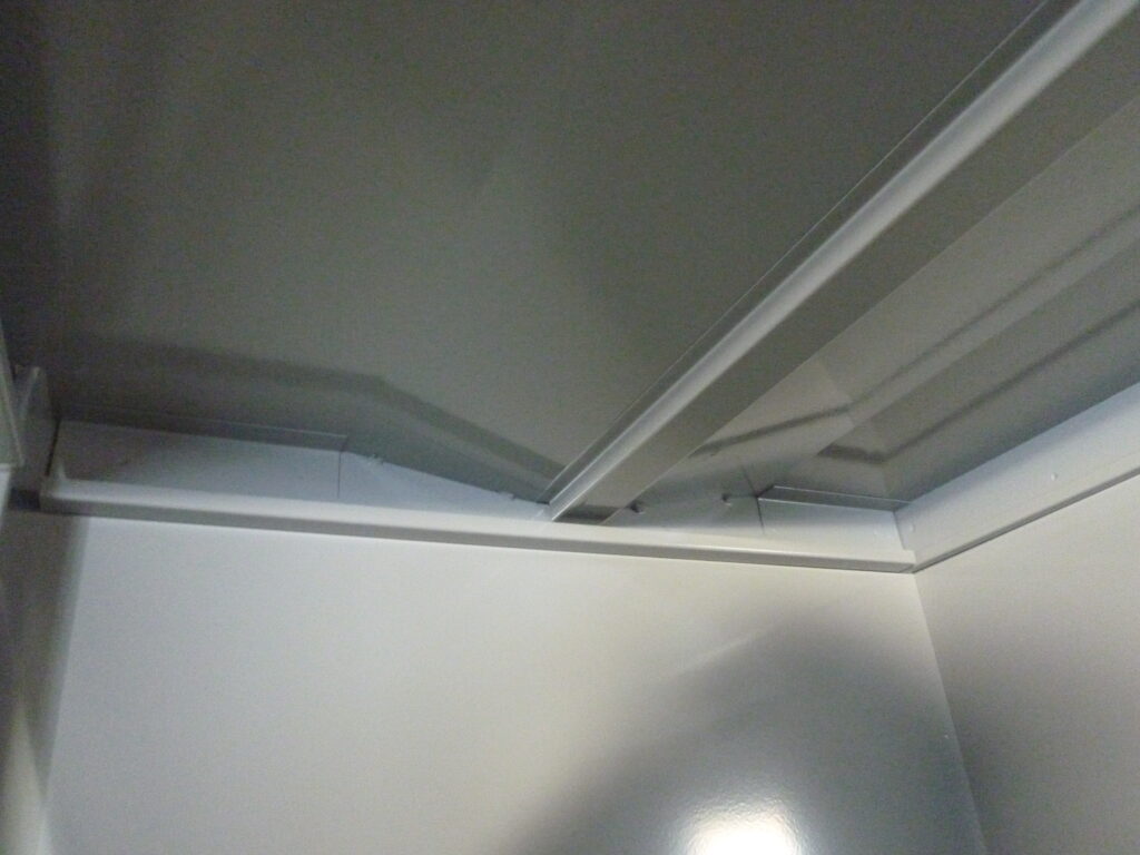 ホース収納棚板(転がり防止型)